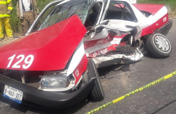 MUERE TAXISTA PRENSADO (FOTOS)